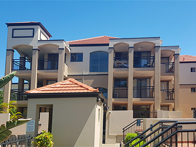 apartment block featuring earthy tones and warm neutrals